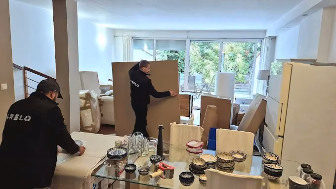 Home move — the 4RELO crew packing furniture